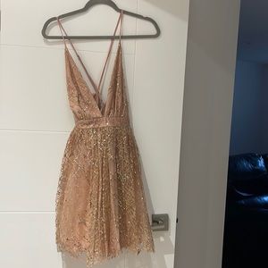 Cute small mesh dress with sparkles and sequence that has only been worn once!